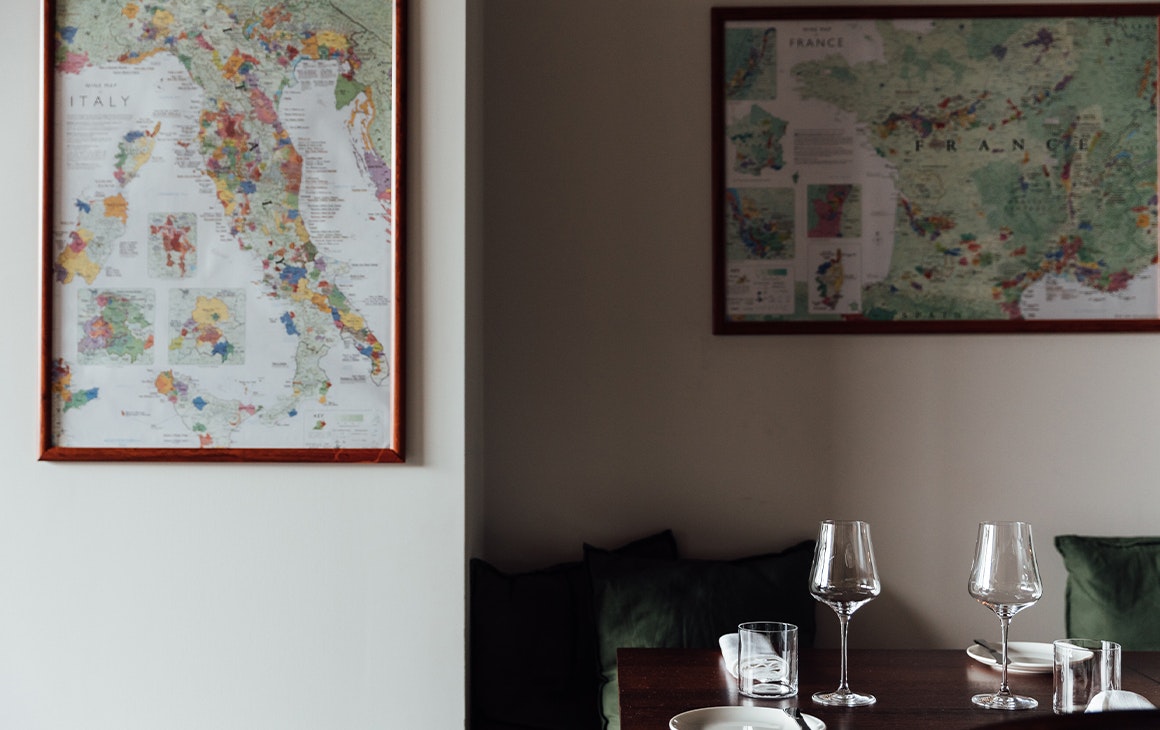 a table below framed maps
